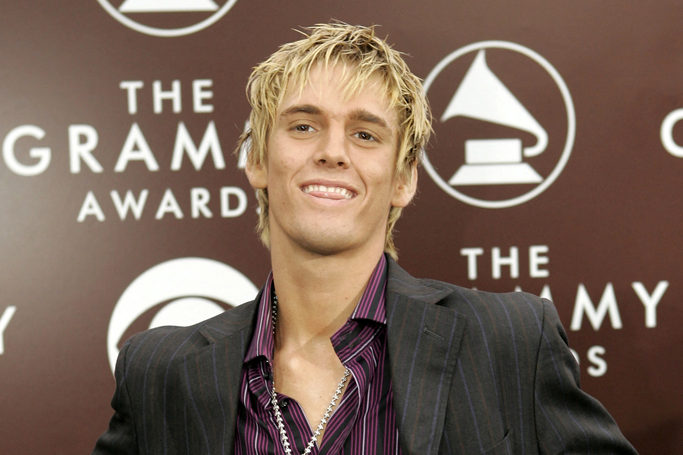 FILE PHOTO: Singer Aaron Carter arrives at the 47th annual Grammy Awards.